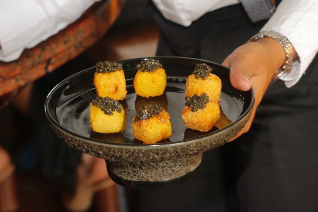 Golden cubes with caviar
